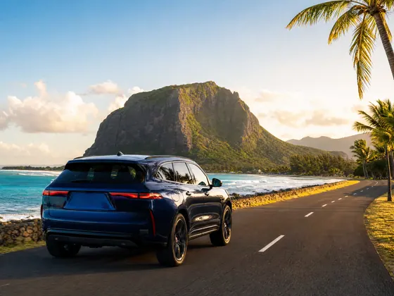 A car on a coastal road in Mauritius